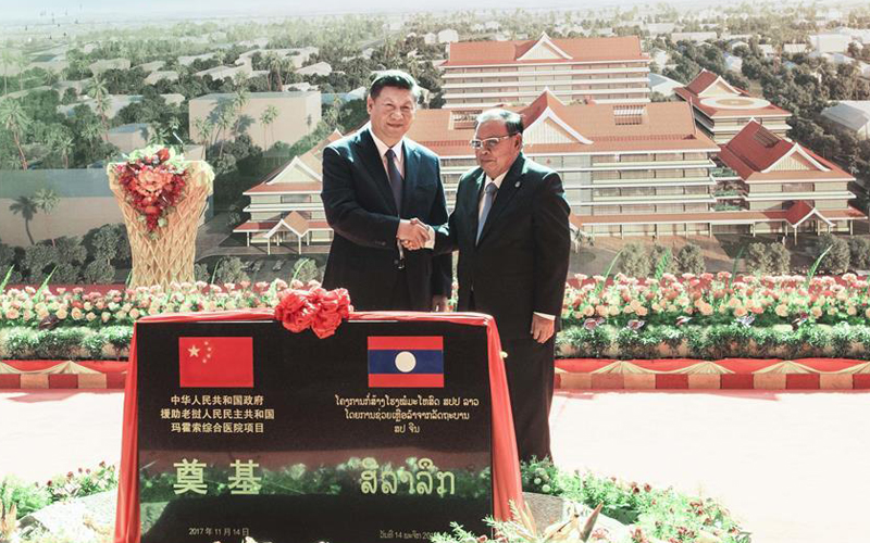 Xi calls for more China-Laos cooperation in public welfare