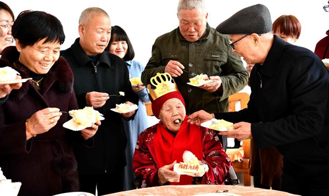 Centenarian celebrates her 105th birthday with family on 1st day of Chinese Lunar New Year