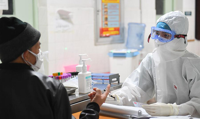 Pic story: Young male nurse volunteers to join battle against epidemic in central China's Hunan