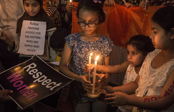 Candle light march held to protest against rape and murder of eight-year-old girl in India