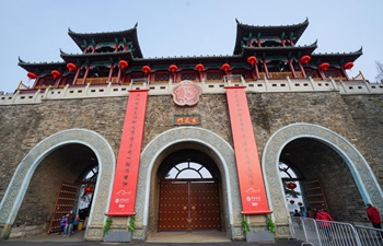 City gates of Nanjing adorned with large-size Spring Festival couplets