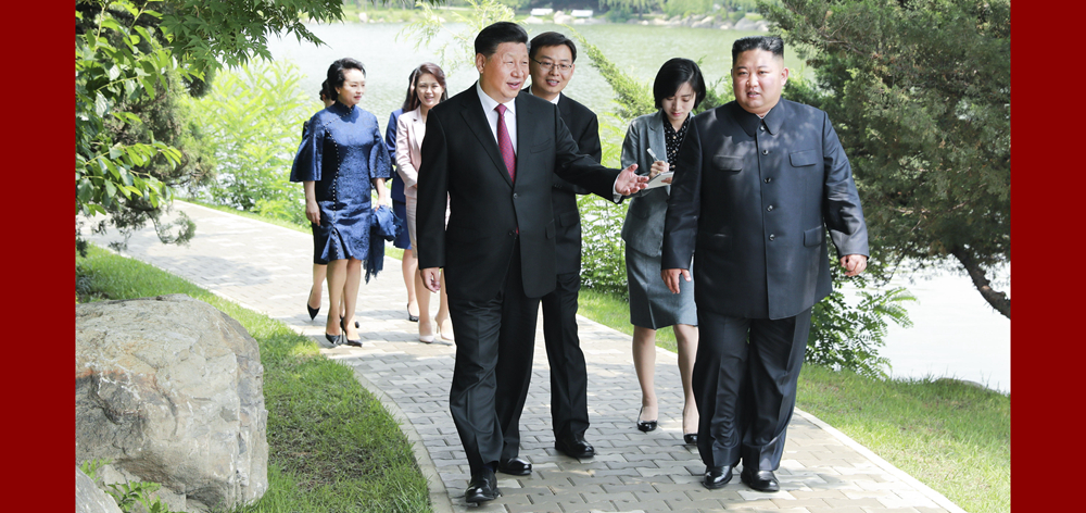 习近平会见朝鲜劳动党委员长、国务委员会委员长金正恩